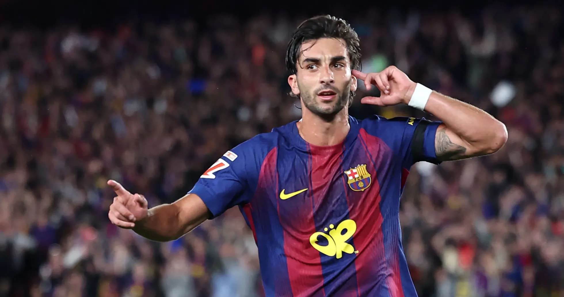 Player celebrating a goal in Barcelona jersey