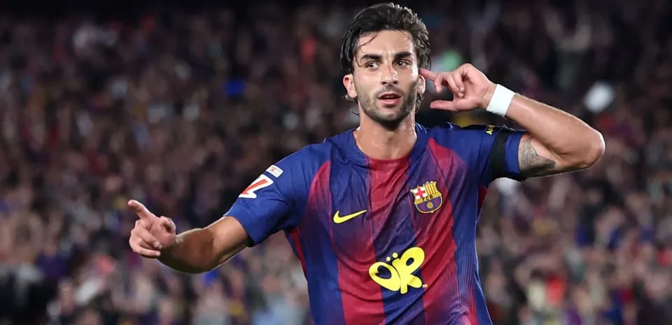 Player celebrating a goal in Barcelona jersey