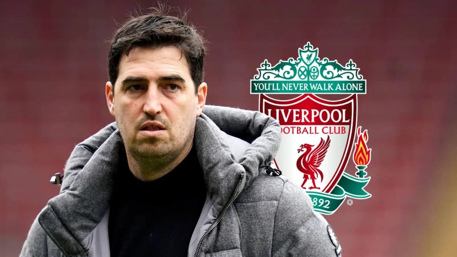 Coach with Liverpool FC logo in background