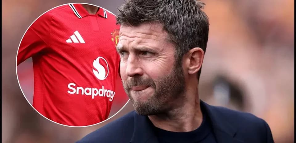 Coach looking thoughtful with Manchester United jersey