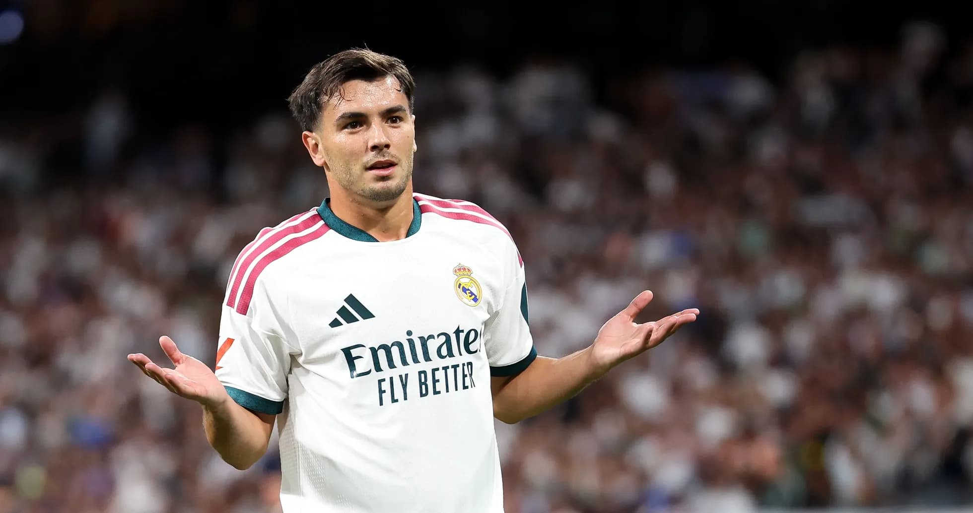 Player gesturing during a match for Real Madrid