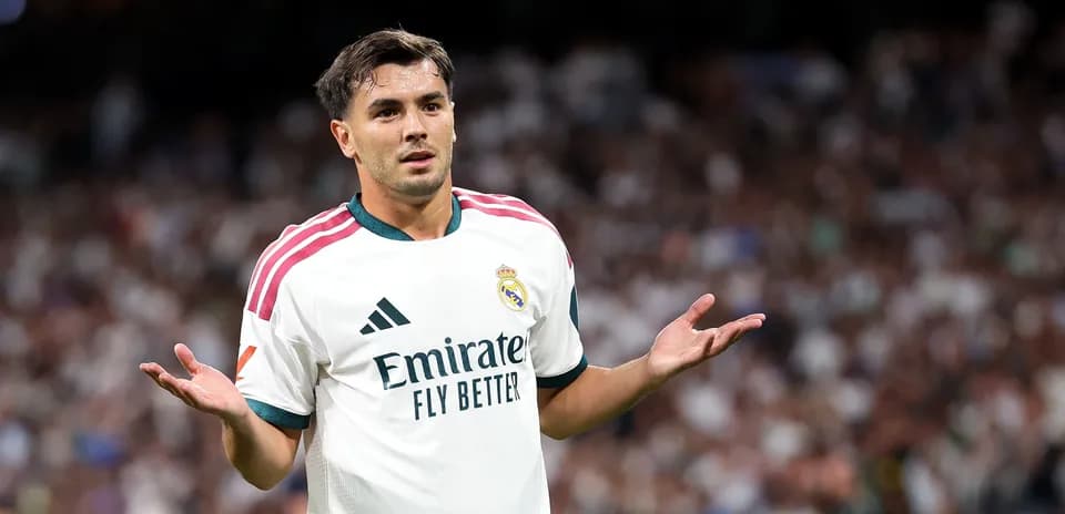 Player gesturing during a match for Real Madrid