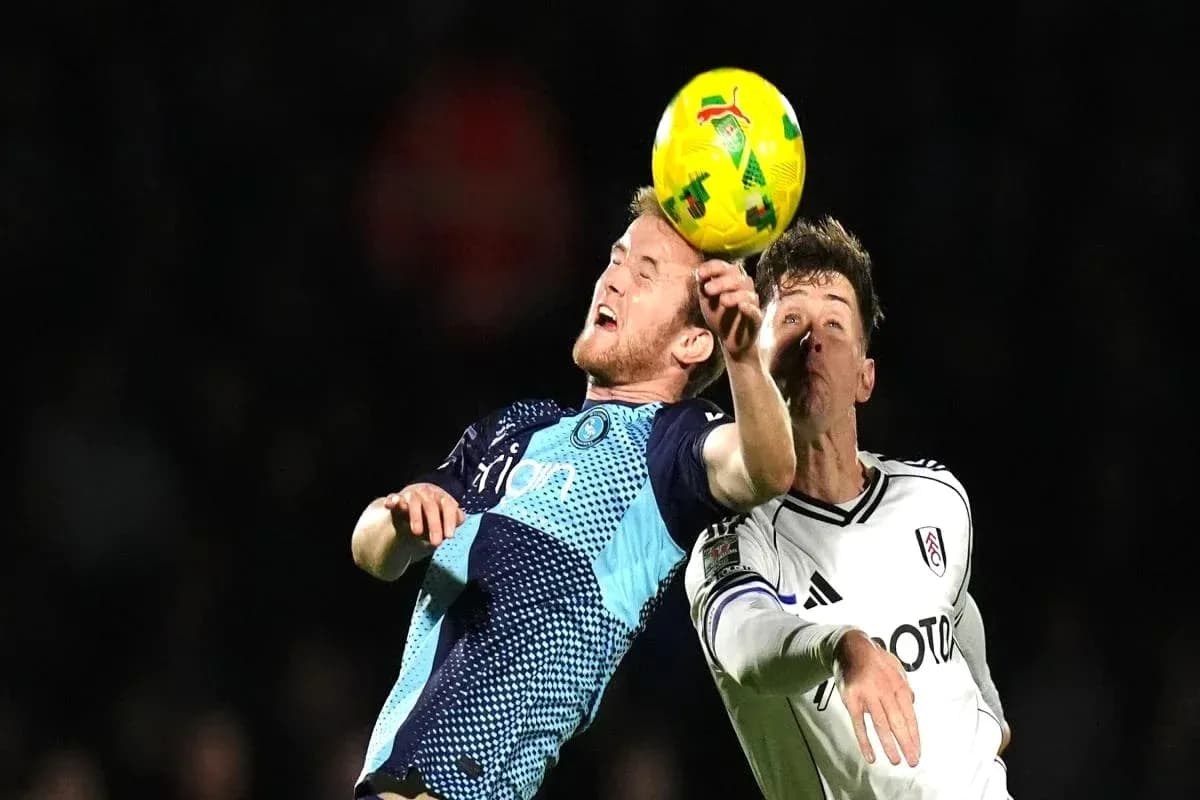 Two players contesting a high ball during match