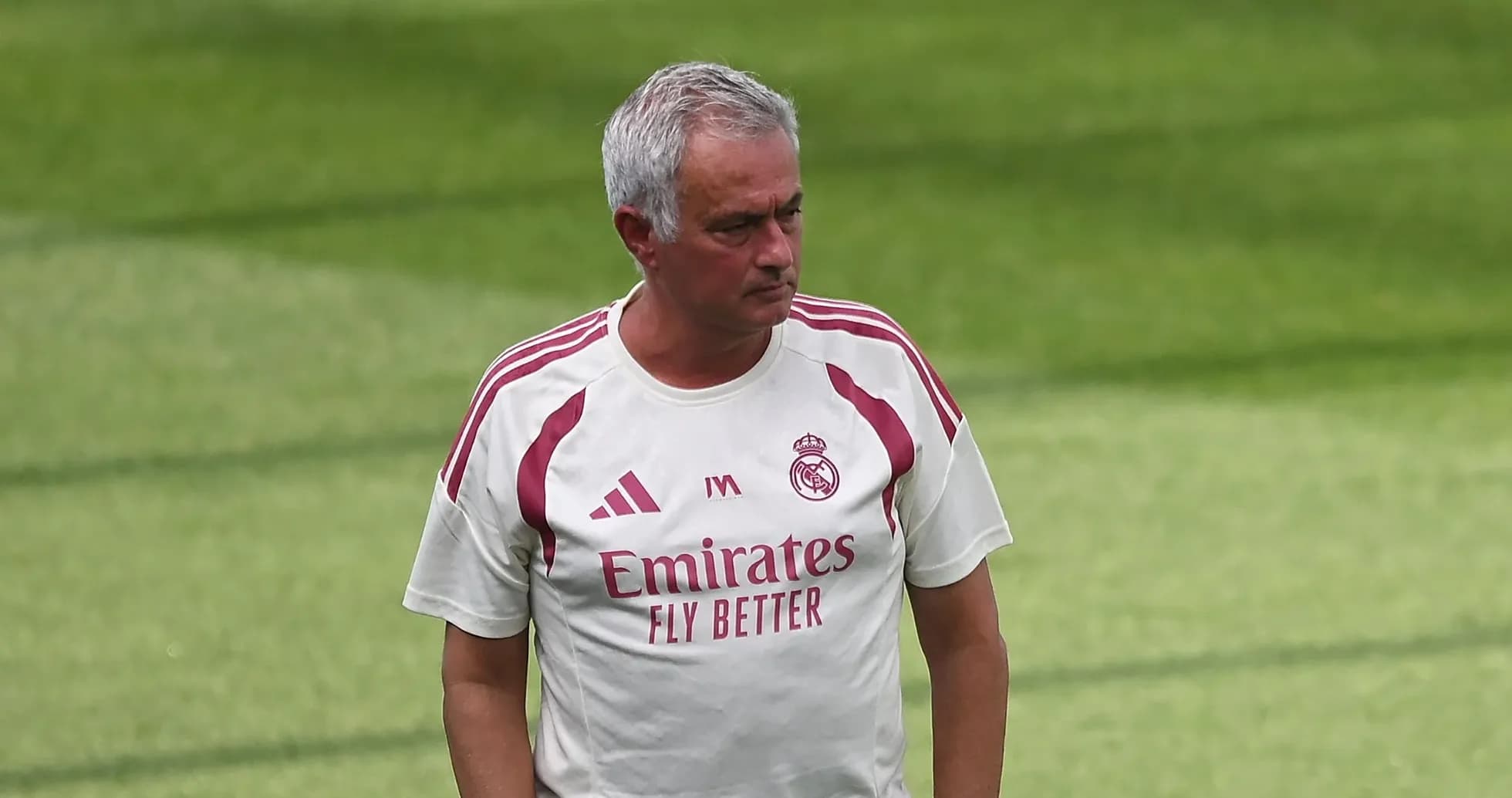 Coach walking on the training pitch in Madrid