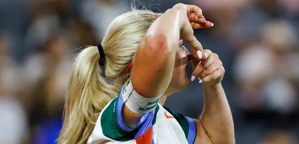 Athlete adjusting headband during sports event