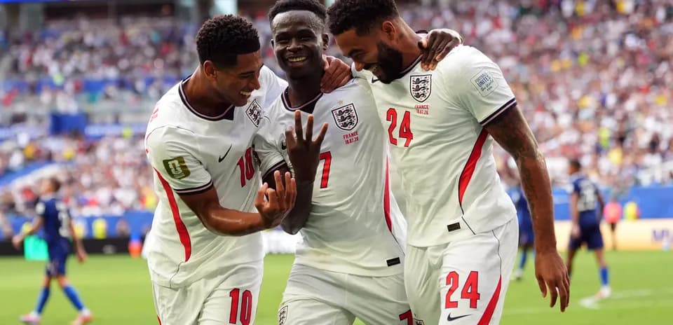 England players celebrating a goal during match