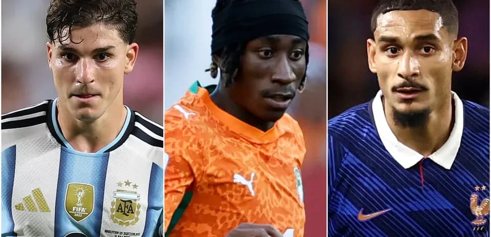 Three football players in their national team jerseys