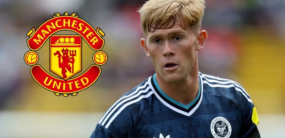 Player in action during match with Manchester United logo
