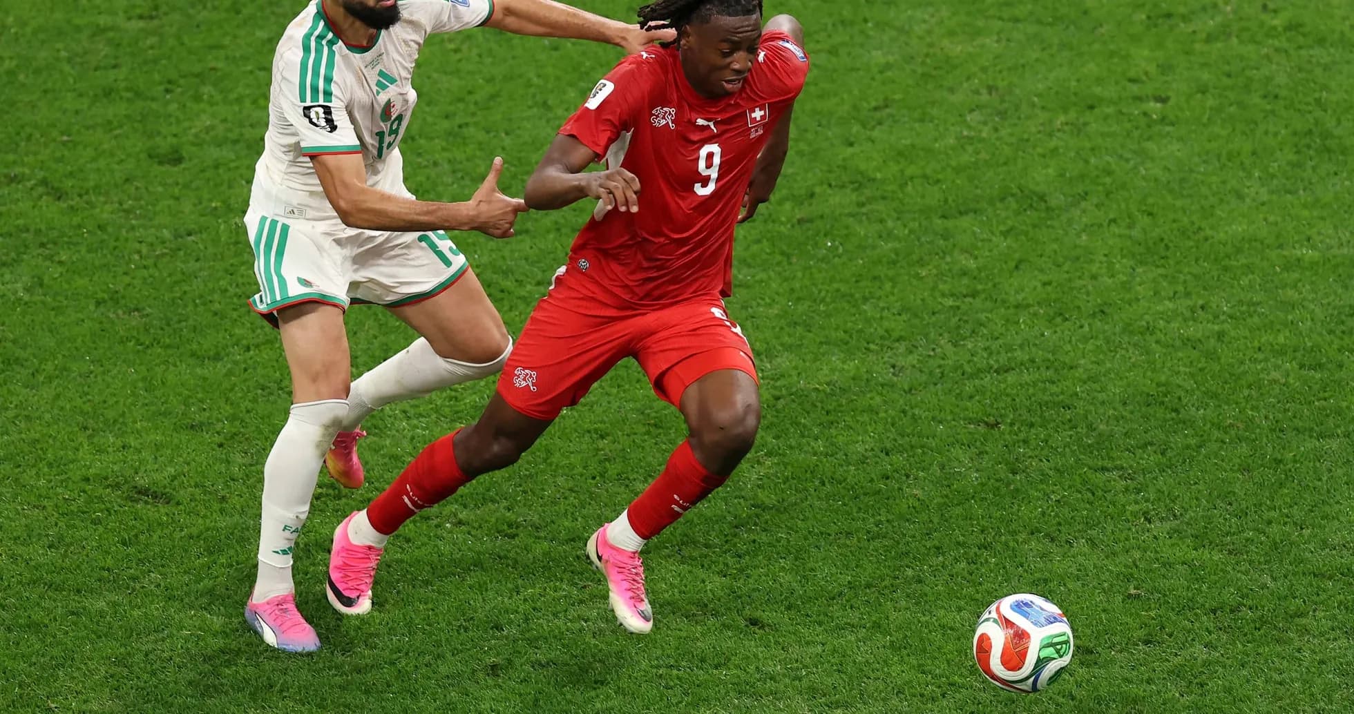 Player competing for the ball in match