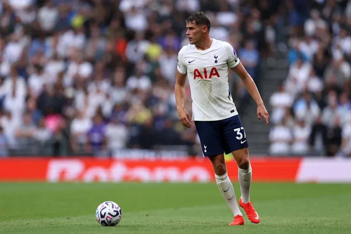 Player in Tottenham kit during match on field