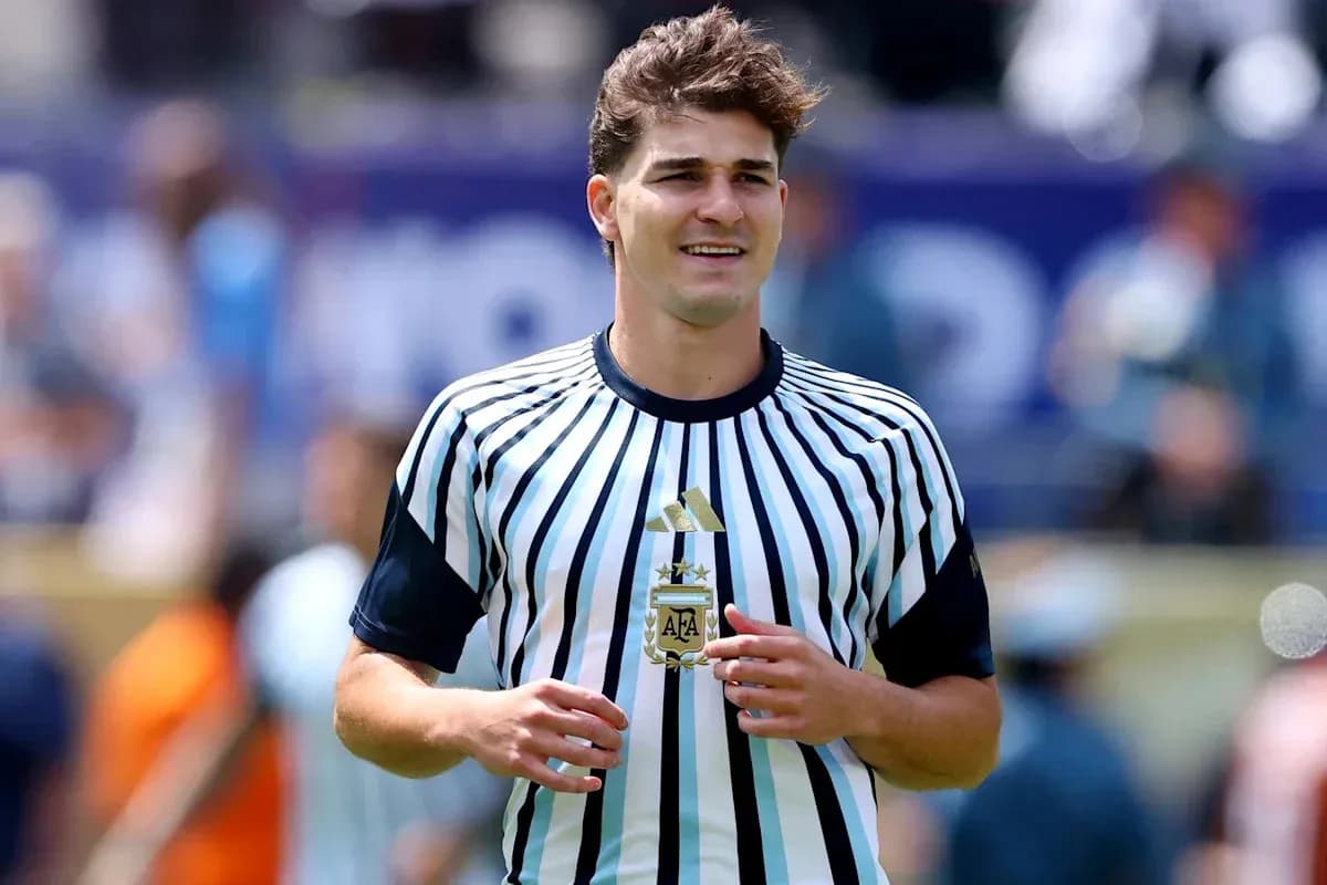 Player in striped jersey during match warm-up