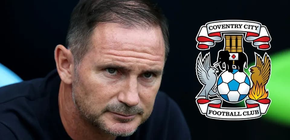 Manager focused during match with Coventry City logo