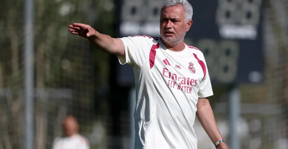 Manager directing players during training session