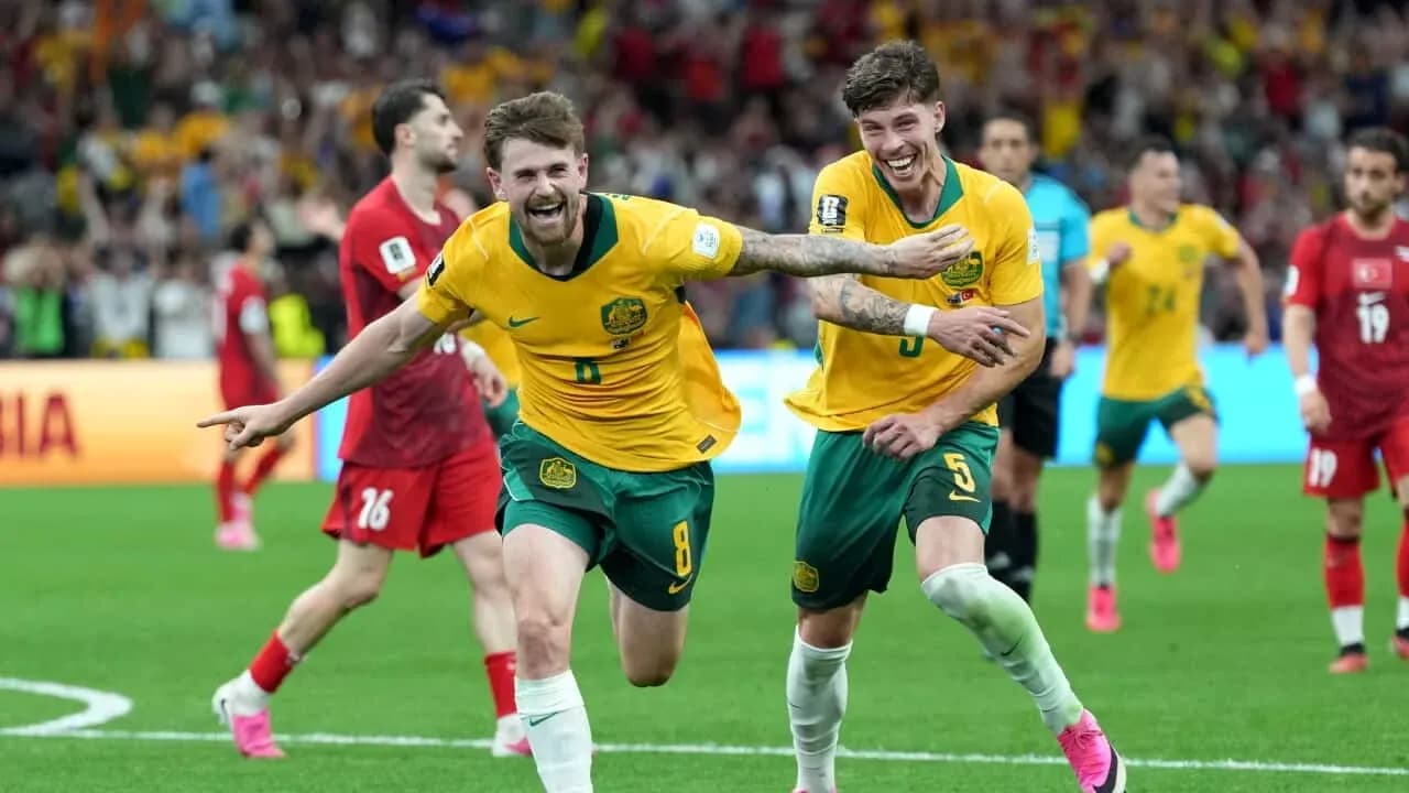 Australian players celebrating during World Cup match