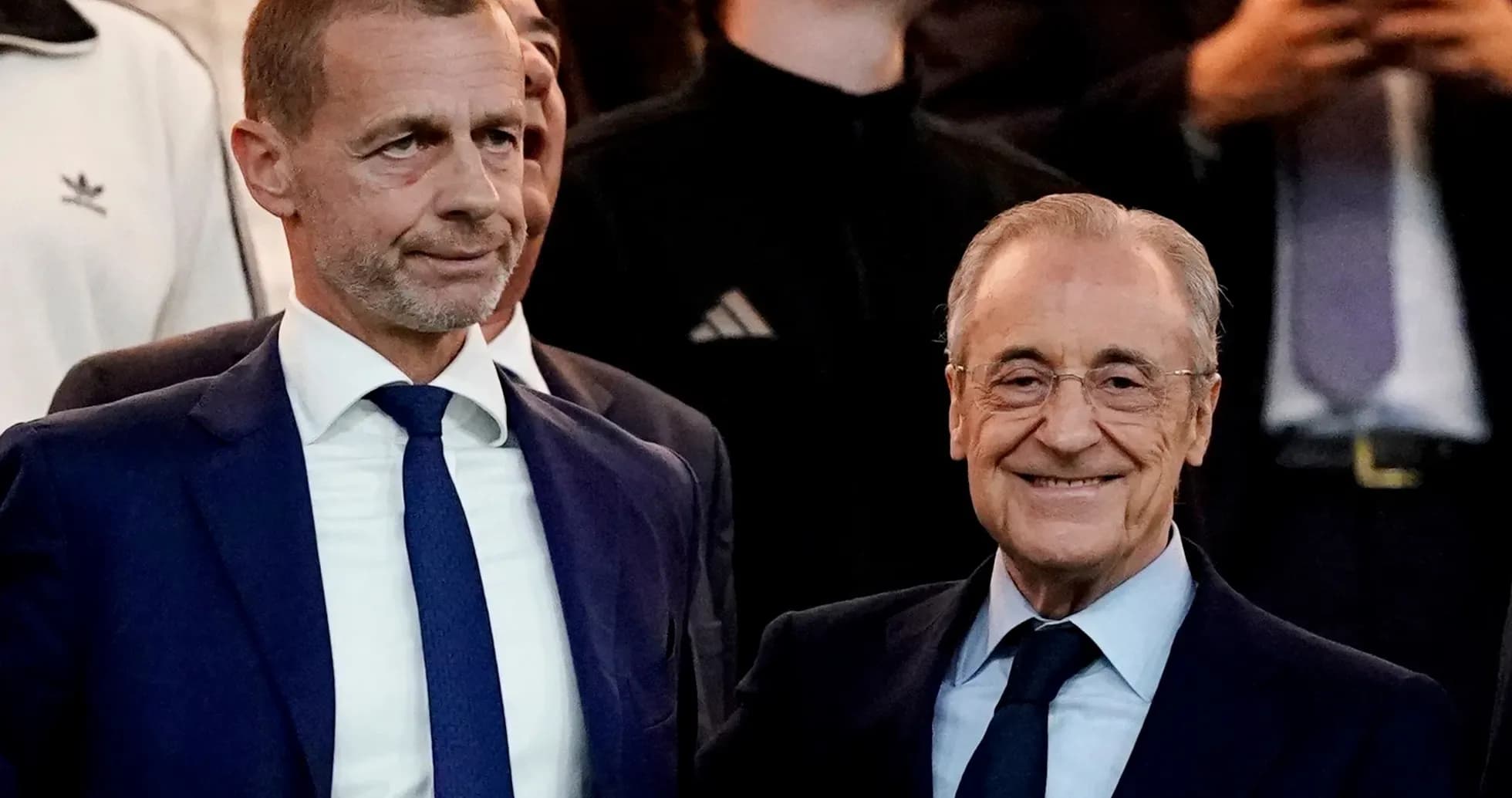 UEFA president and club president posing together