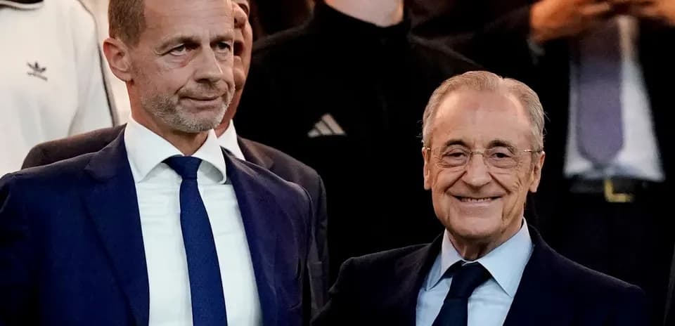 UEFA president and club president posing together