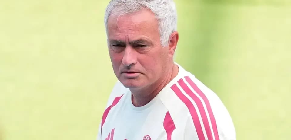 Coach in training kit during practice session