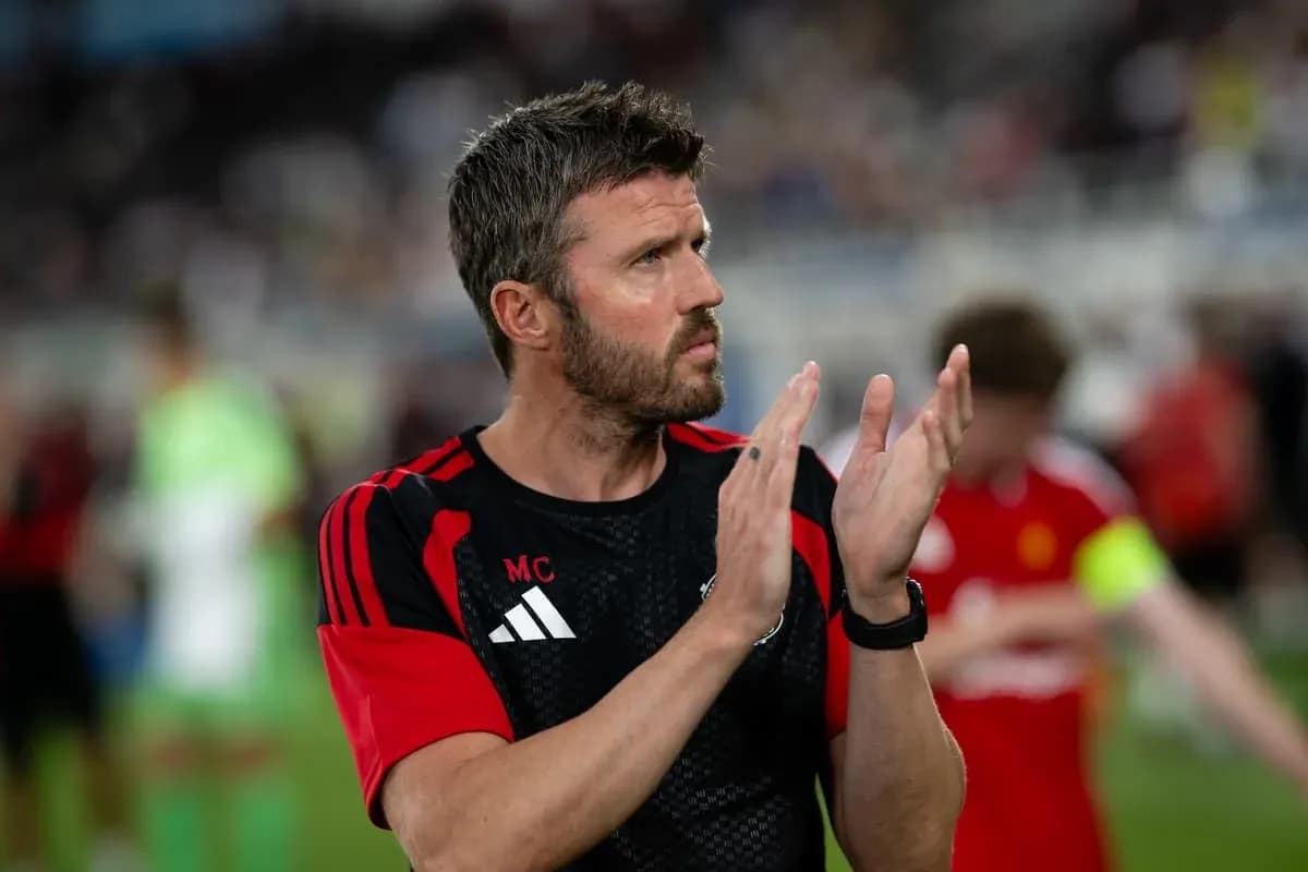 Coach applauding during warm-up on the field