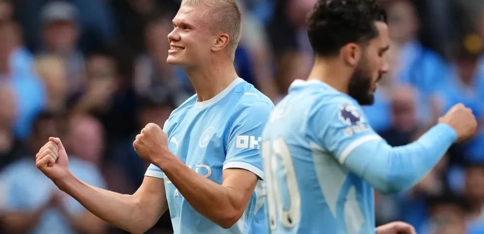 Player celebrating a goal during Manchester City match