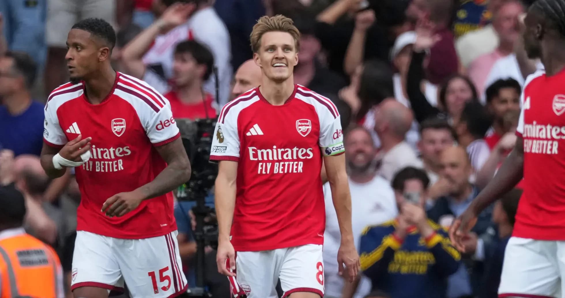 Arsenal players celebrating during Premier League match