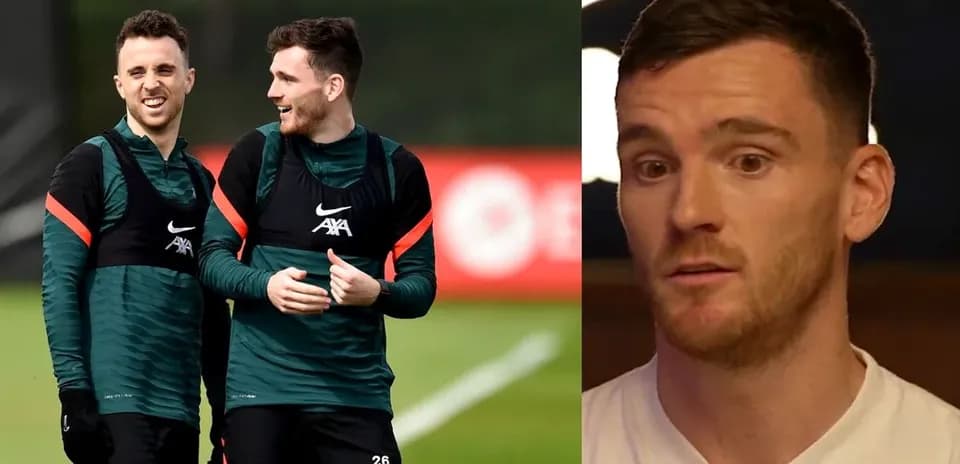 Two players laughing during Liverpool training session