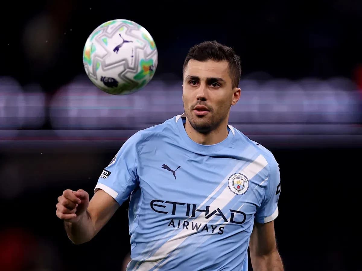 Player in light blue jersey controlling a soccer ball
