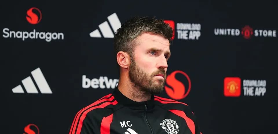 Manager at Manchester United press conference backdrop