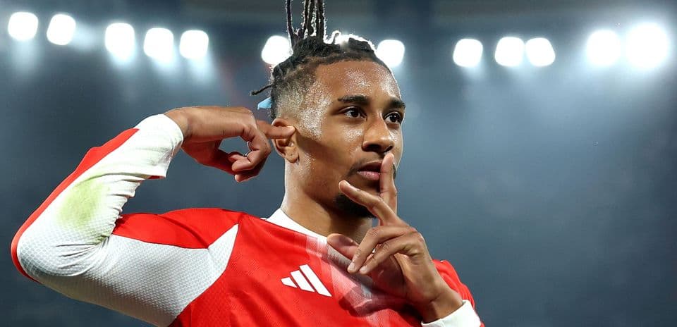 Player celebrating with finger to lips gesture