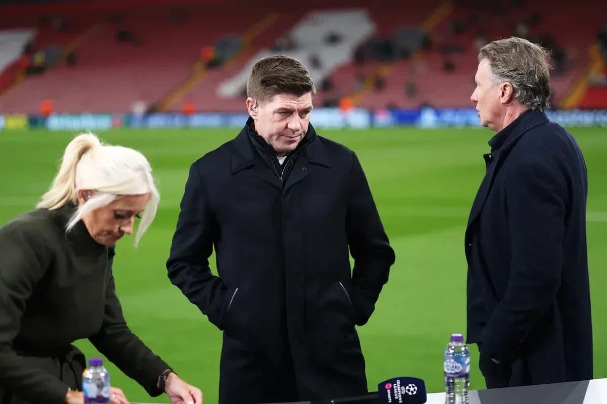 Three analysts discussing on the pitch side