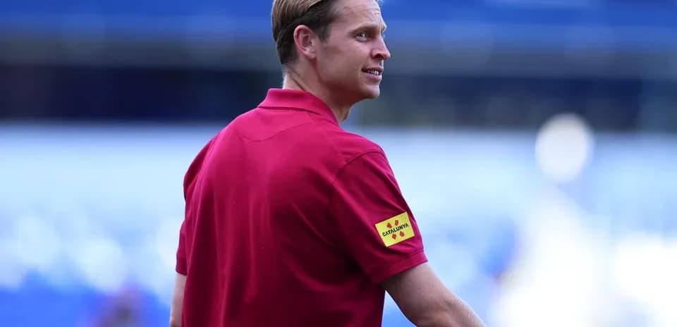 Referee observing the field before the match