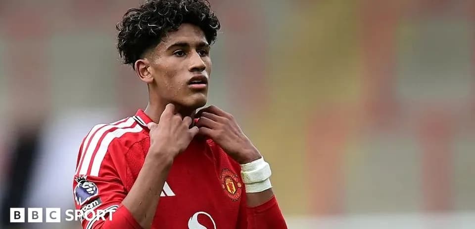 Young player adjusting his shirt during match