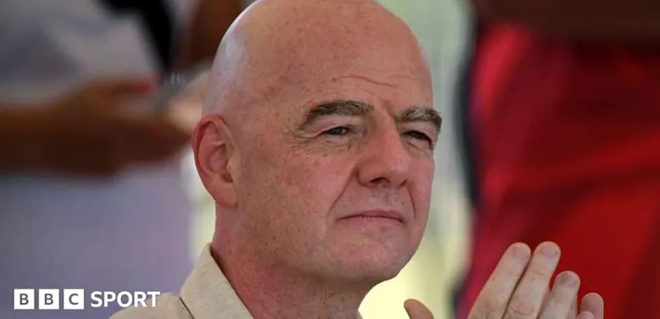 Man with bald head sitting and looking thoughtfully