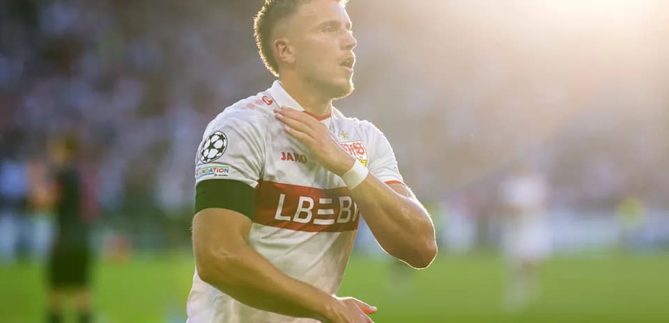 Player celebrating during UEFA Champions League match