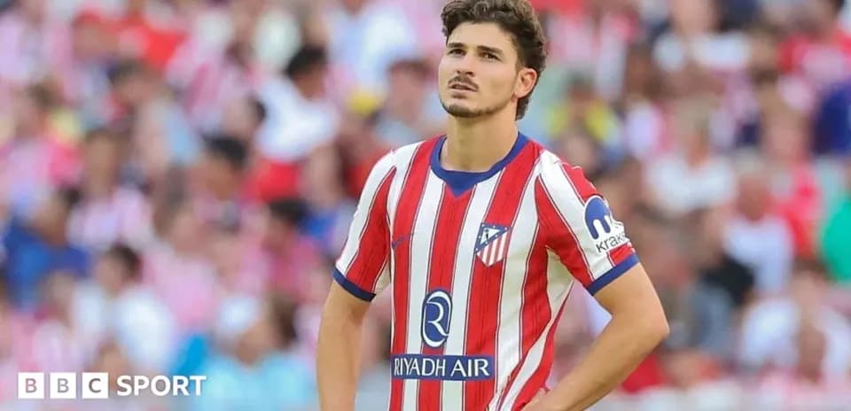 Atletico Madrid player looking on during match