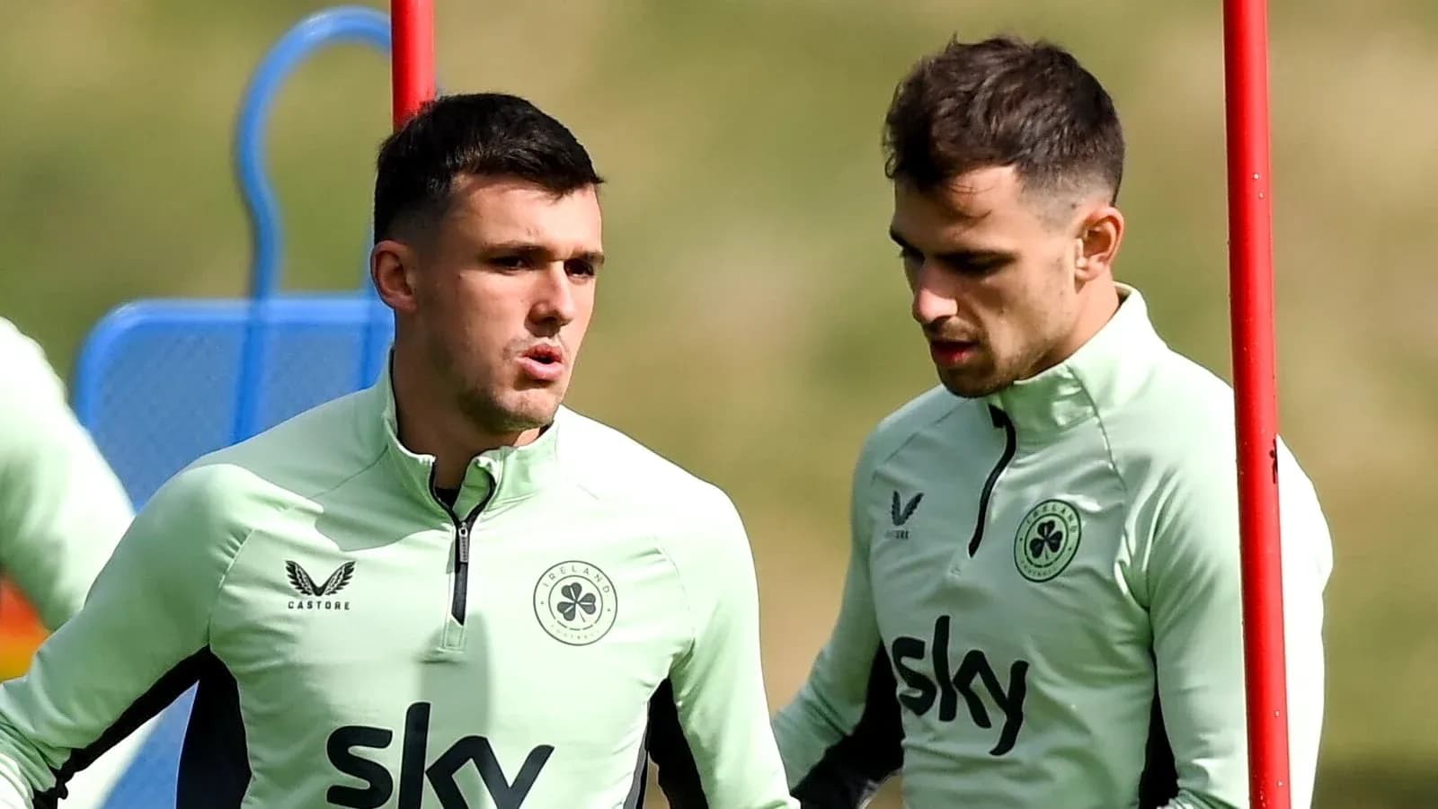 Two players talking during training session