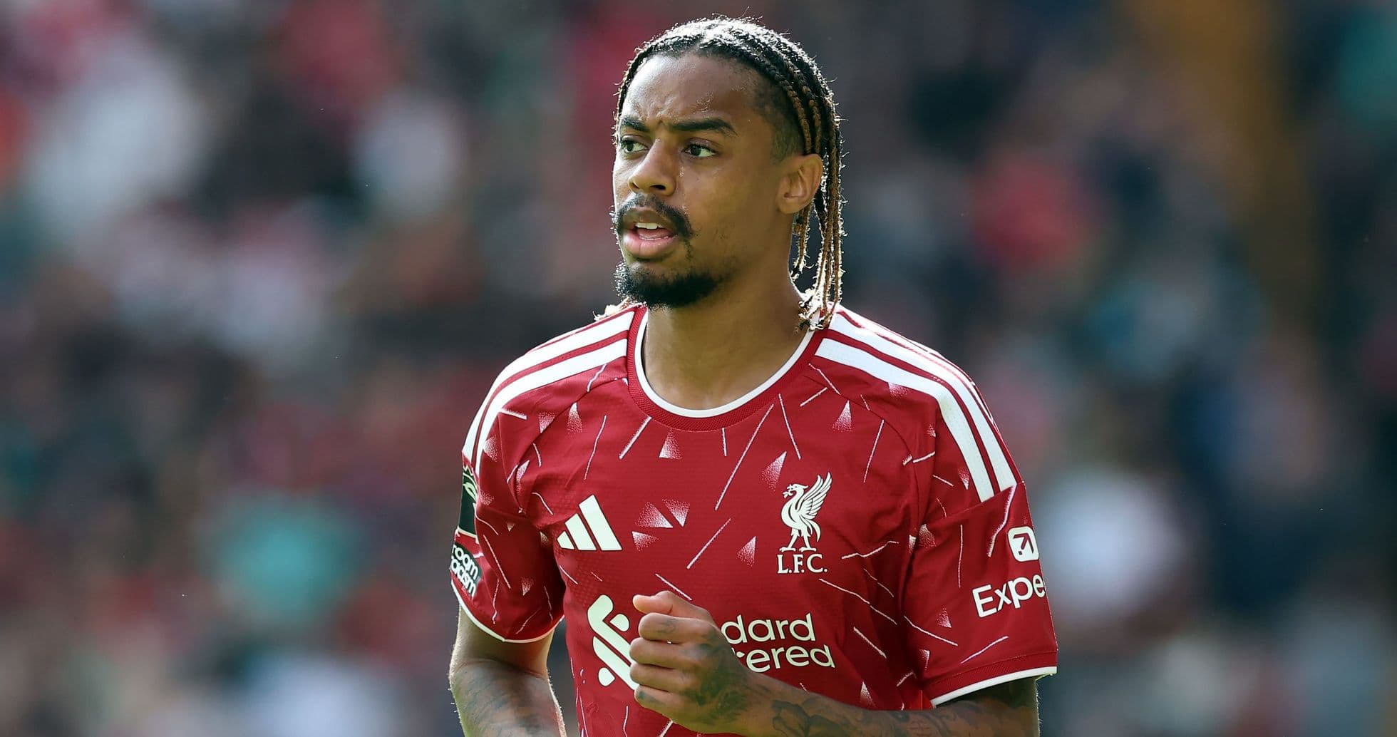 Liverpool player in red kit during match