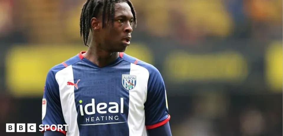 Player in West Bromwich Albion kit on field