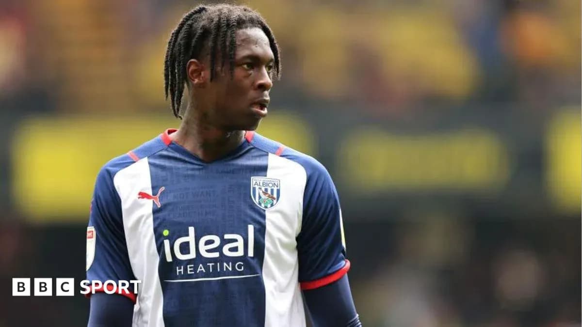 Player in West Bromwich Albion kit on field
