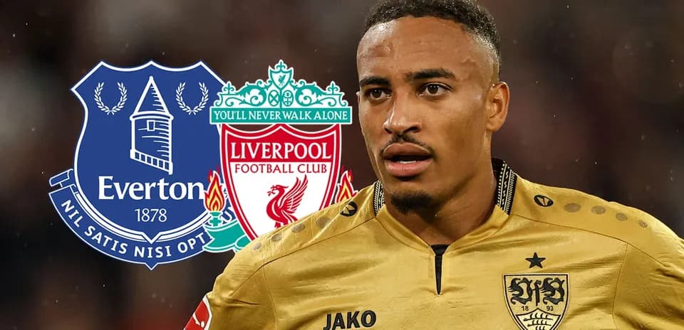 Player in gold jersey with Everton and Liverpool logos