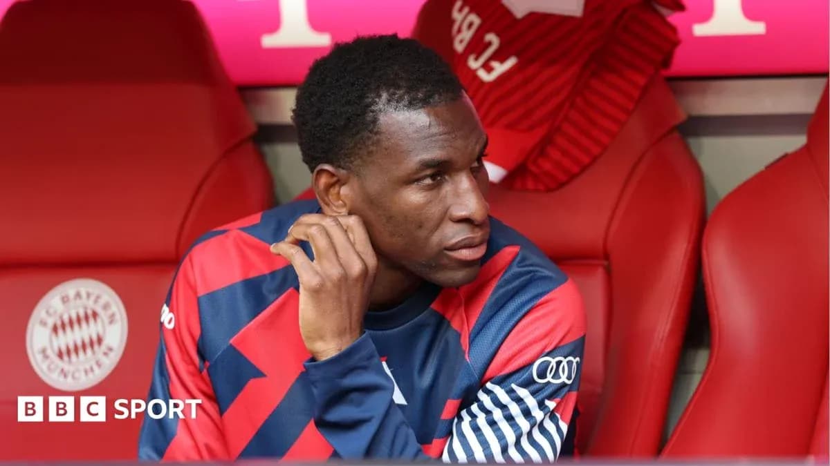 Player sitting on bench during match