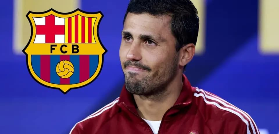Player seated with FC Barcelona logo in background
