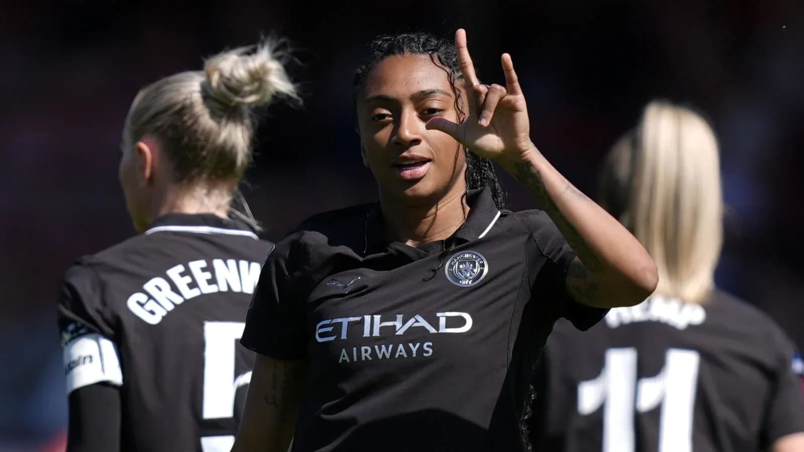 Player celebrating with teammates during match