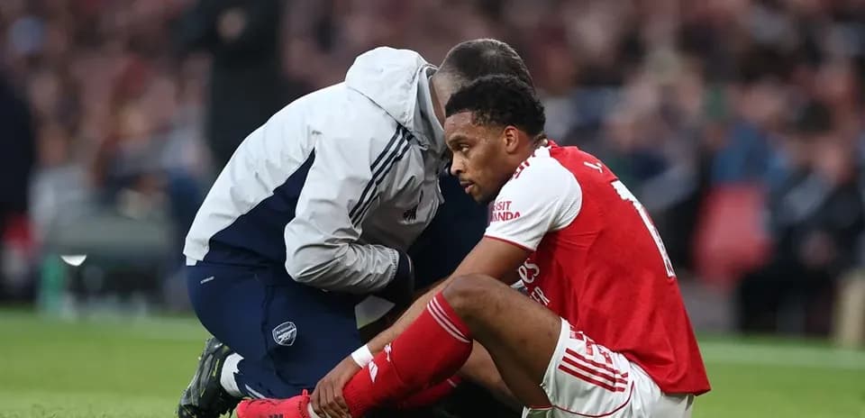 Player receiving medical attention on the field