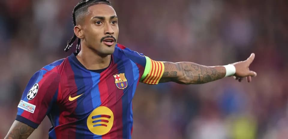 Player gesturing during match in Barcelona jersey