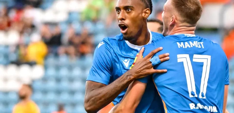 Players celebrating a goal during match