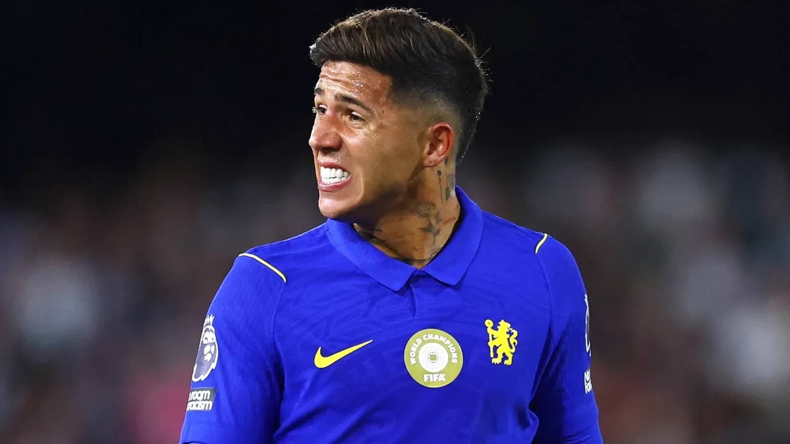 Player in blue jersey reacting during a match