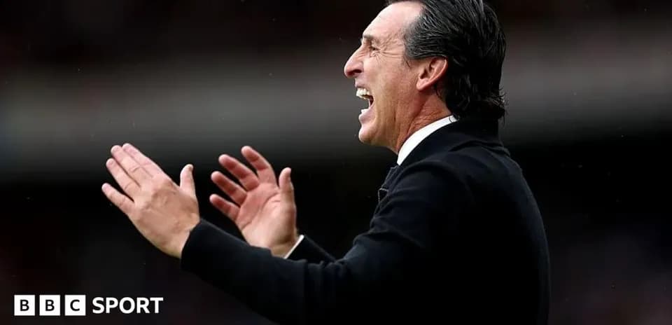 Coach celebrating and directing players during match