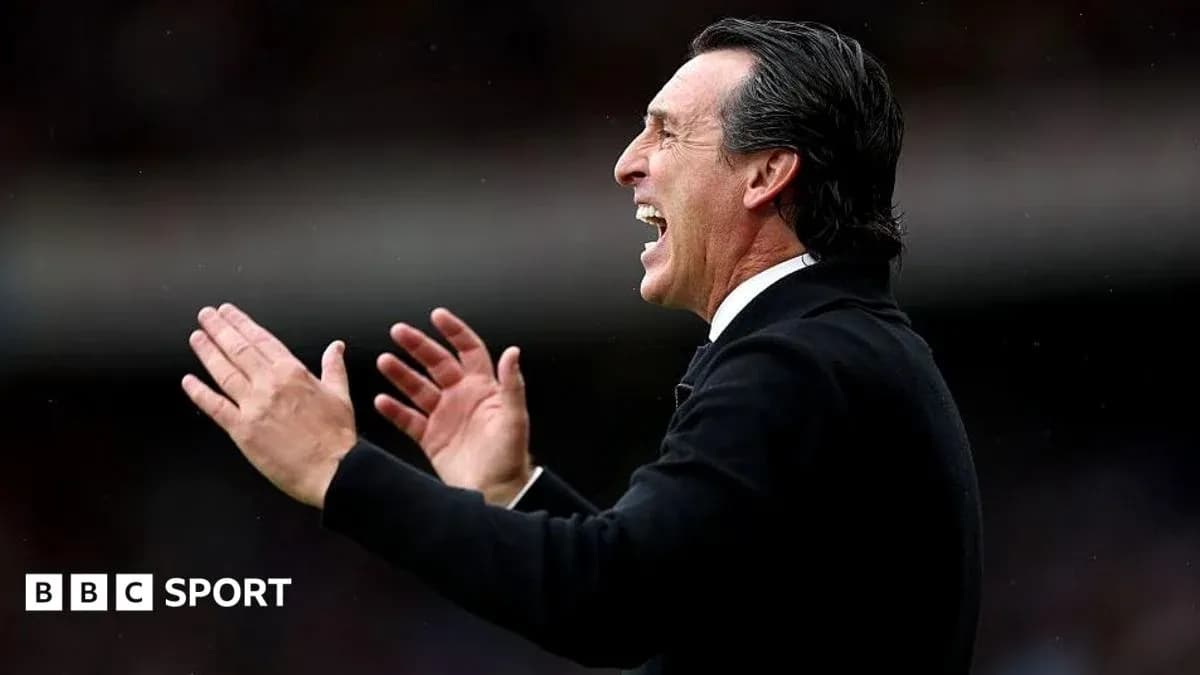 Coach celebrating and directing players during match