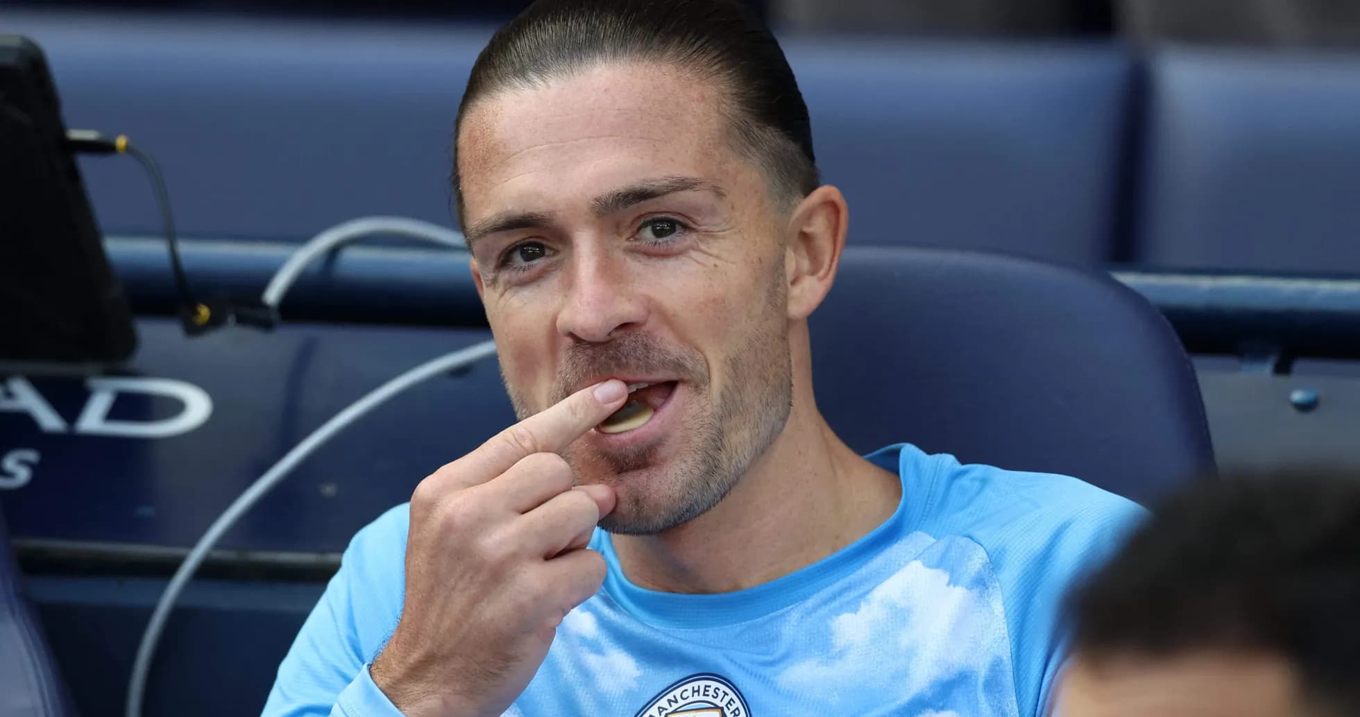Player eating on bench during match