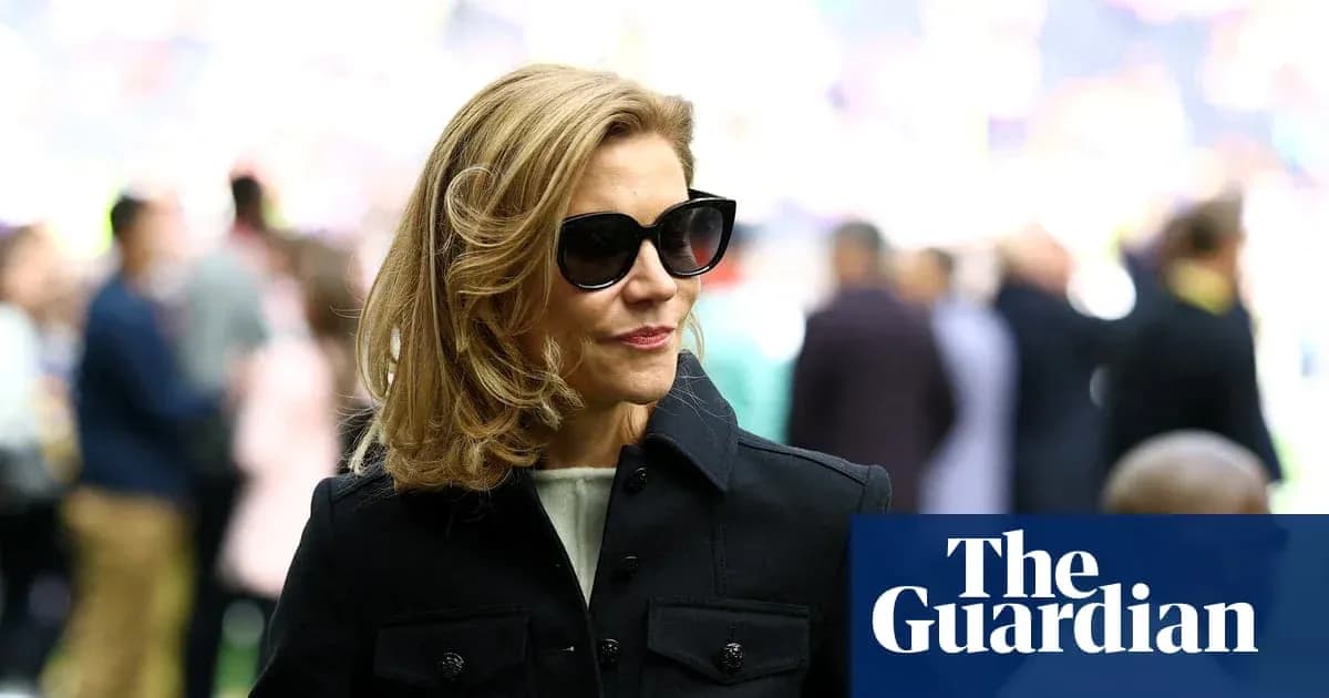 Woman wearing sunglasses at sports venue